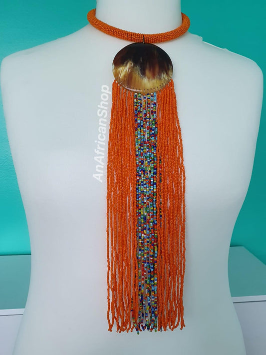 Beads on curved horn necklace, Orange