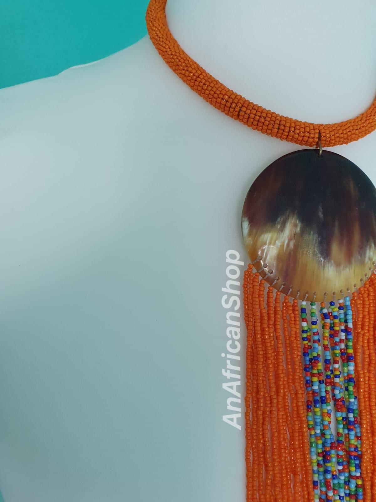 Beads on curved horn necklace, Orange